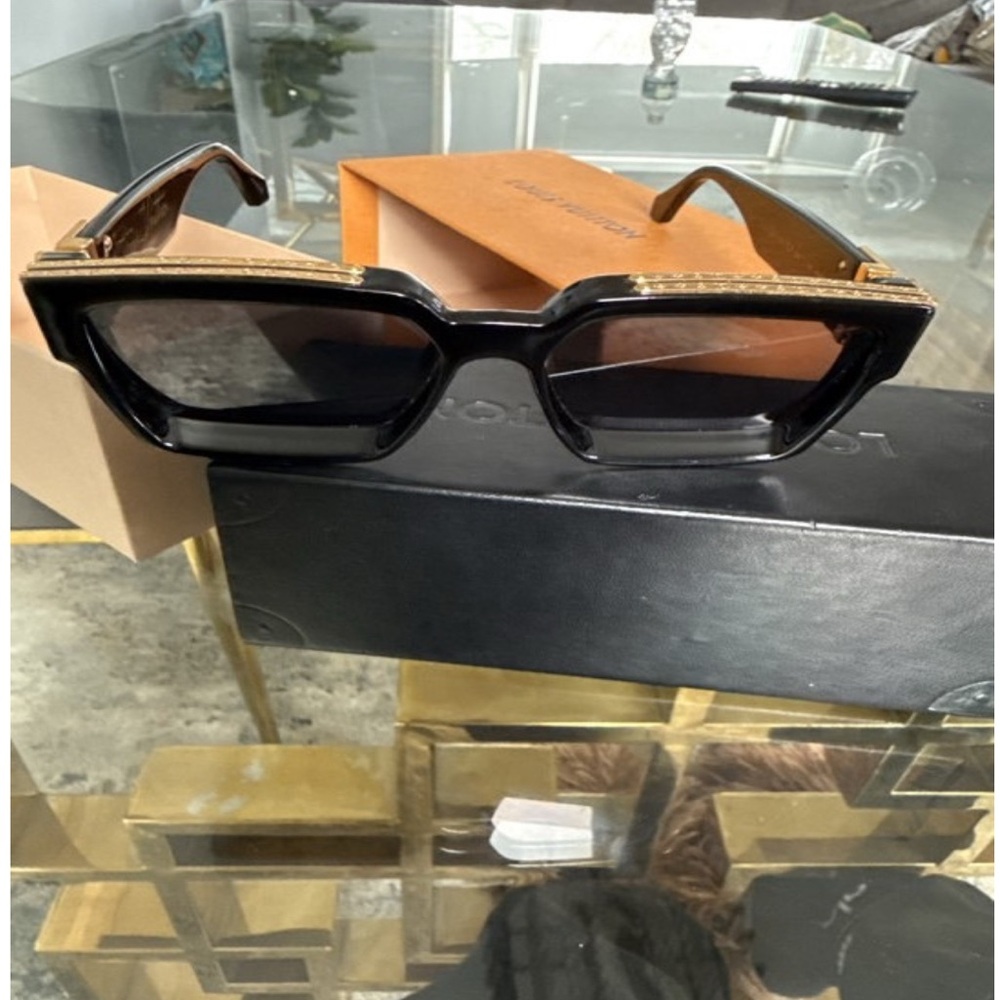 Elegant Black Sunglasses by Louis Vuitton